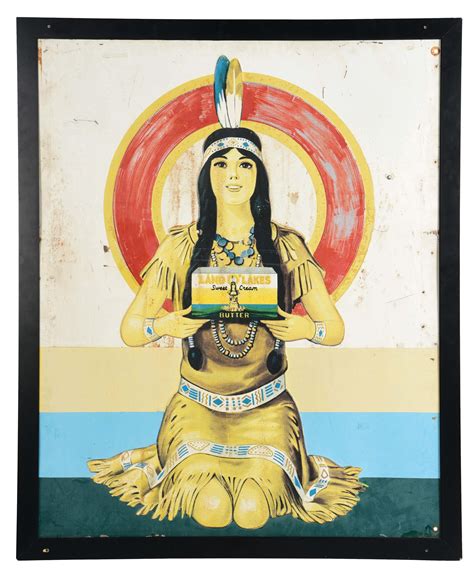 Lot Detail - EMBOSSED TIN LAND O LAKES BUTTER SIGN W/ NATIVE AMERICAN