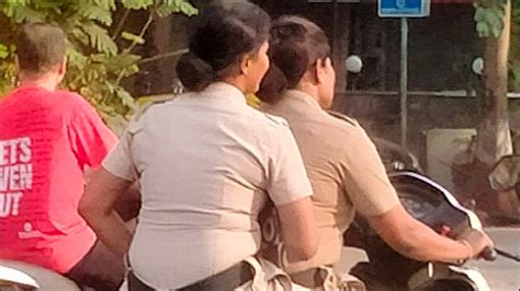 Pic Of Two Female Cops Riding A Scooter Without Helmet Goes Viral