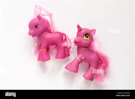 Two pink My little pony toys isolated on white background Stock Photo - Alamy