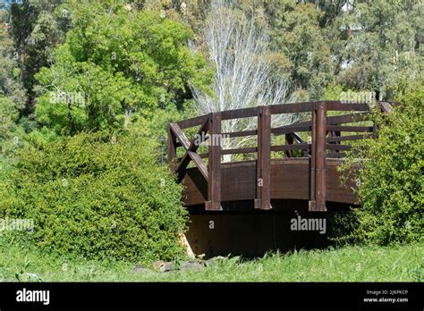 A Scenic View Of A Wooden Bridge In The Adventure Park Do Jamor In