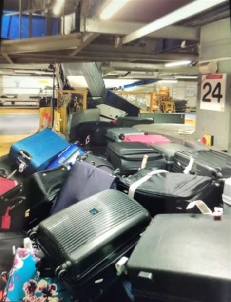 MAYHEM at Manchester Airport as boxes piled high at security and