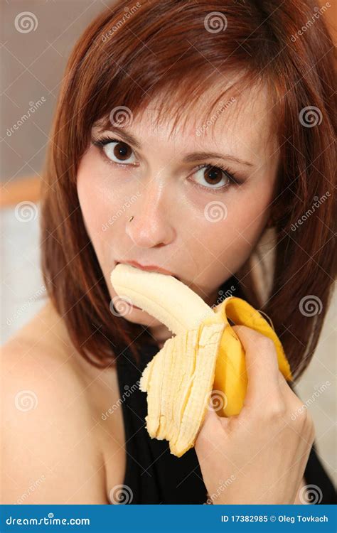 Picture Of Young Woman Eating Banana Stock Image Image 17382985