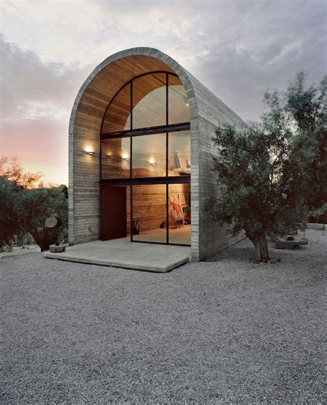 A Curved Concrete Art Warehouse By A31 Architecture | iGNANT.com