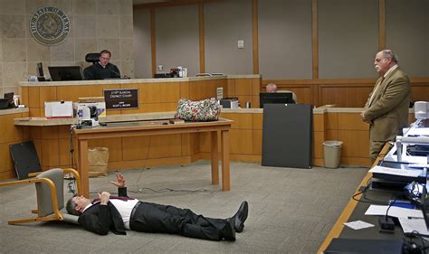 Texas man on trial for murder reenacts for the jury how he found ...