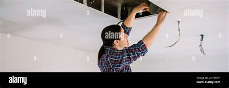 Woman preparing extractor hood installation Stock Photo - Alamy