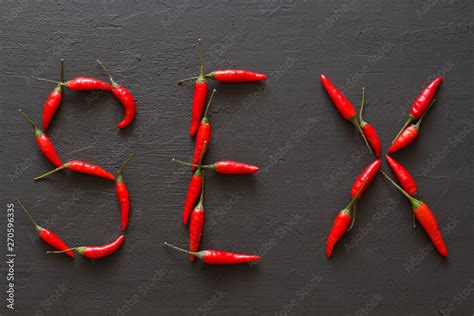 Word Sex Red Hot Chili Peppers On Black Background On Black Table Swx Letter Arranged From Red