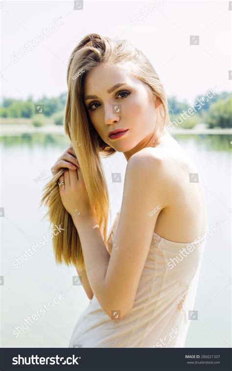 Sexy Blonde Girl On Lake Shore Stock Photo Shutterstock