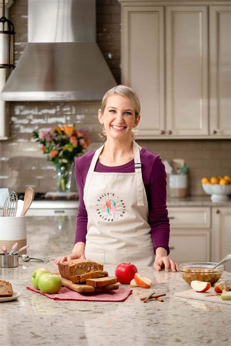 Sally At Counter With Apples Bread And Other Baking Ingredients