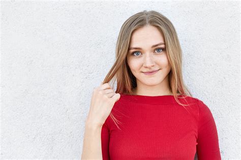 Adorable Female With Fair Hair Warm Blue Eyes And Dimples On Her Cheeks