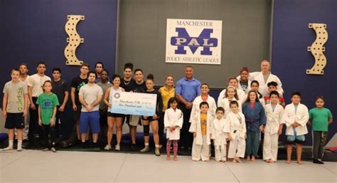 Manchester Police Athletic League Receives Donation From The National