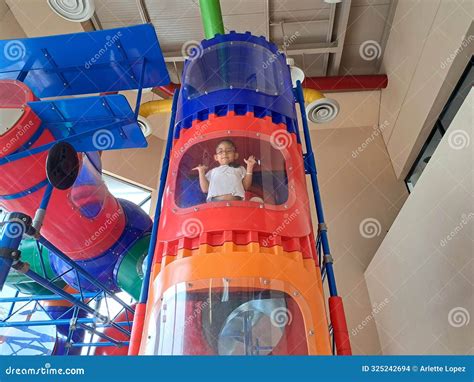 Year Old Brunette Girl With Glasses Climbs Games To Test Her Ability And Develops Motor Skills