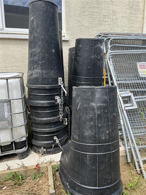 A Quantity Of Black Pvc Rubble Chutes