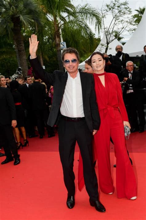 Photo Gong Li et son compagnon Jean Michel Jarre Montée des marches