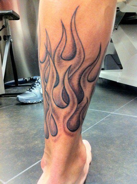 Flame Tattoos On Lower Arm