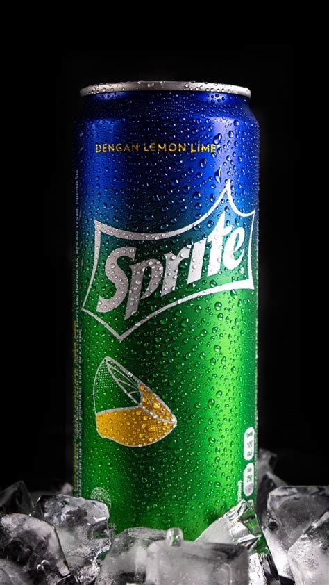 a can of sprite sitting on top of ice