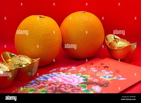 Chinese New Year Decoration With Oranges Colorful Packets And Gold