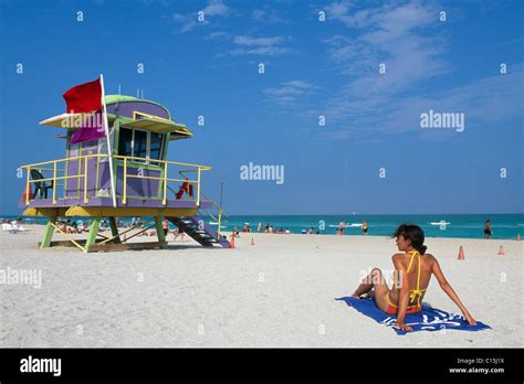 Woman And Lifeguard Tower At South Beach Miami Beach Miami Florida