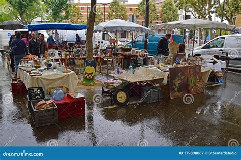 Vendors Selling Painting And Second Hand Items At Vanves Flea Market On