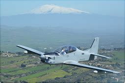 Grey Tucano flying in the South African sky :-) - Flying Legend