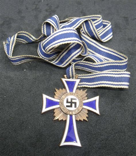 The Cross of Honour of the German Mother Bronze with ribbon in Nursing