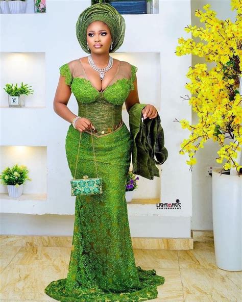 Nigerian wedding guest outfits | African fashion, African attire, African lace dresses