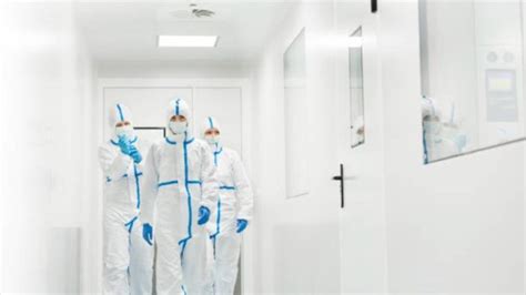 What is the purpose of a clean room suit?