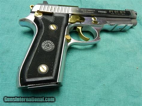 TAURUS PT92 AFS STAINLESS WITH GOLD ACCENTS