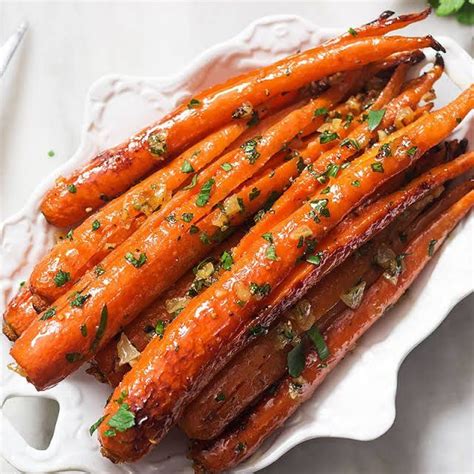 Honey Garlic Butter Roasted Carrots Recipe Yummly Recipe Carrot Recipes Roasted Carrots