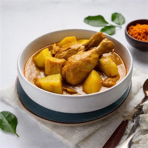 Premium Photo Malaysian Style Chicken Curry With Potatoes Kari Ayam