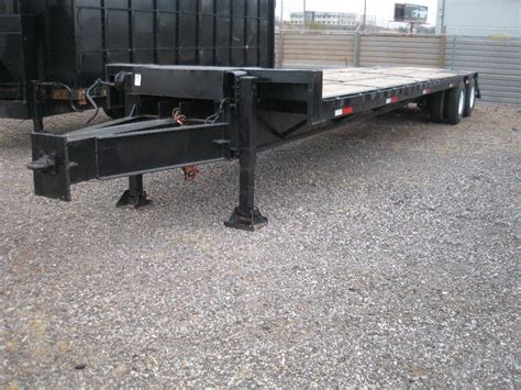 30' HEAVY DUTY TANDEM AXLE TRAILER W/PINTLE HITCH;