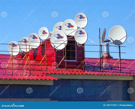 Many Satellite Dishes Are Installed On The Roof Editorial Photography