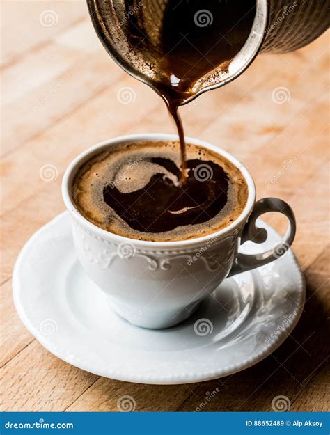Pouring Turkish Coffee into the Cup. Stock Image - Image of kahvesi