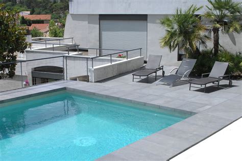 Drop face bluestone pool coping and matching pavers installation images