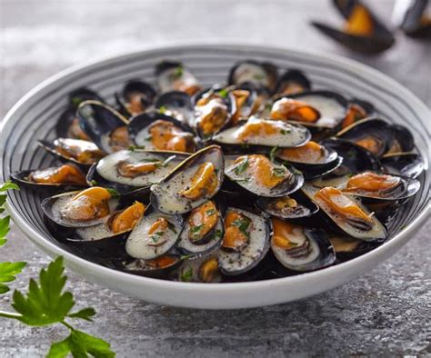 Mussels with crème fraiche and herbs (Mouclade) - Cookidoo® – the official Thermomix® recipe ...