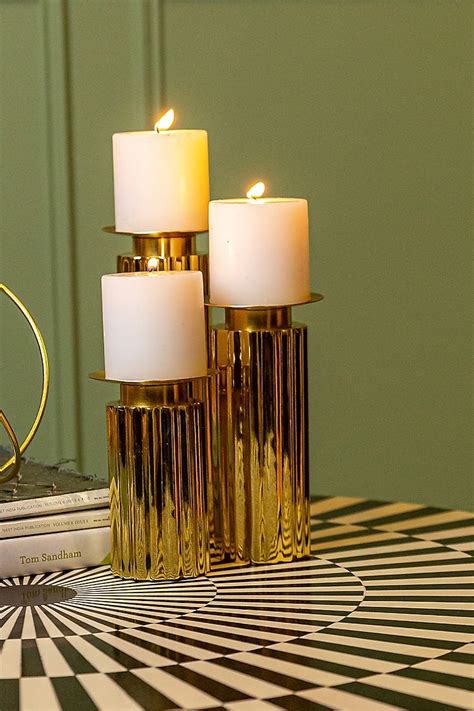 Shiny Gold Stainless Steel Candle Holders Set Of 3 Design By Logam At