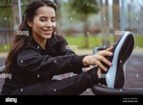 Cute Longhaired Brunette Girl Stretching Her Body Stock Photo Alamy