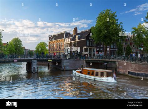 Boat on Prinsengracht canal, Amsterdam, Netherlands Stock Photo - Alamy