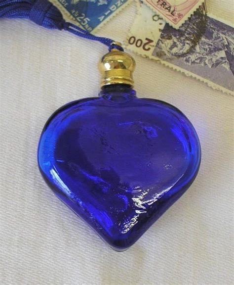 Pin By Mary Mills On Heart Blue Perfume Bottles Blue Glass Blue Perfume