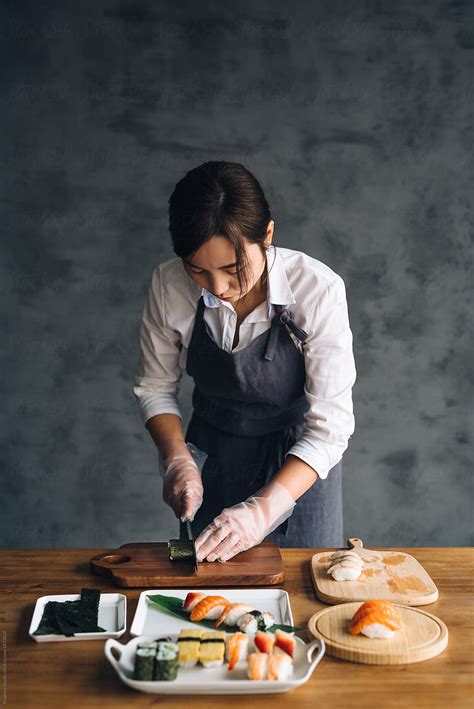 "Chef Making A Sushi Dish" by Stocksy Contributor "MaaHoo" - Stocksy