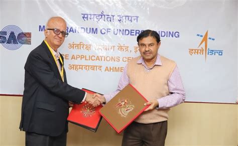 Signing Of Mou By Dr Nilesh Desai Director Sac Of Isro Ashok