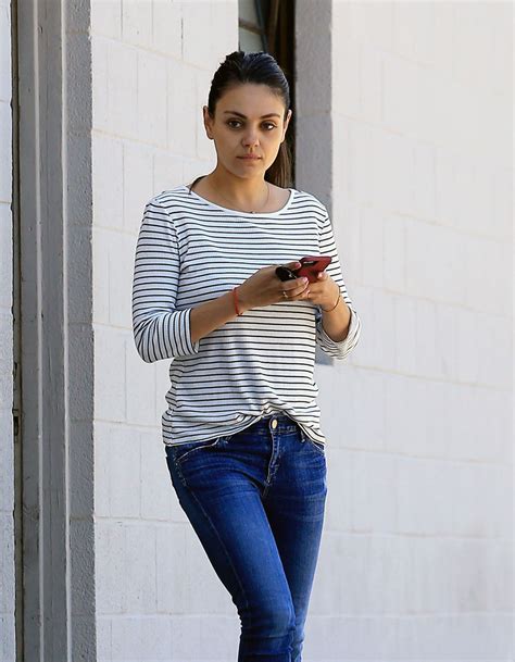 MILA KUNIS in Jeans and a Makeup Free Out in Beverly Hills 03/24/2017 - HawtCelebs