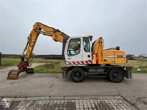 Tweedehands Graafmachine Op Banden Liebherr N