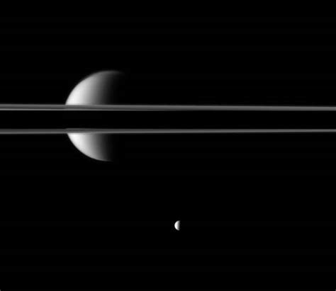 Gallery Saturn Moons Show How Not To Be Seen In Cassini Images Universe Today