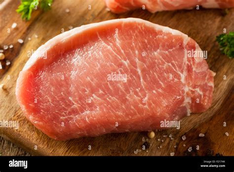 Raw Organic Boneless Pork Chops Ready To Cook Stock Photo Alamy