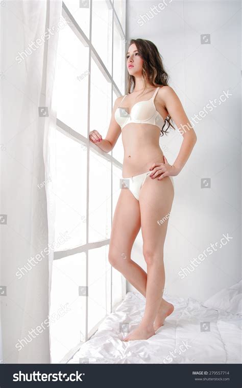 Sexy Girl Wearing White Lingerie Posing Stock Photo