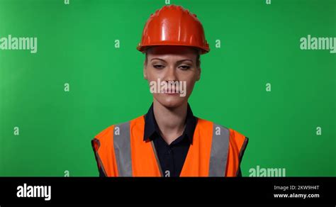 Presentation Portrait Of Engineer Woman Looking Camera Green Screen