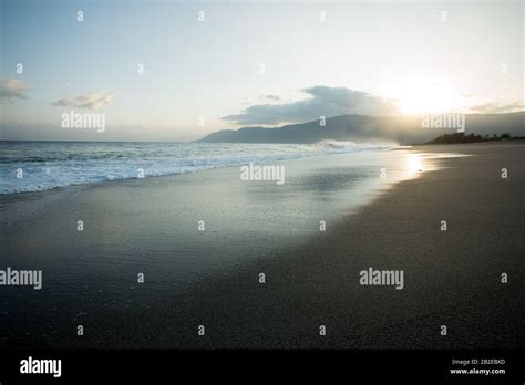 Peaceful sunrise on a beach in the Philippines Stock Photo - Alamy