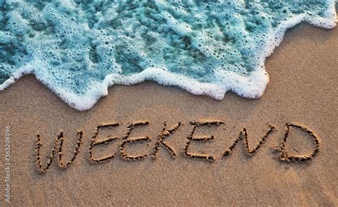 The Word Weekend Written On Sand Sunset Beach Summer Background