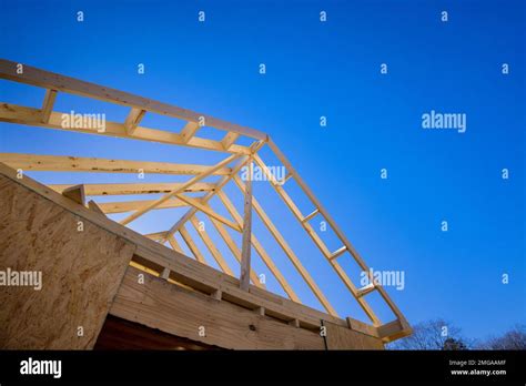 Process Of Constructing Wooden Roof Beam For Newly Built Home Stick