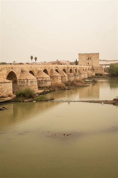 Historical Aqueduct Bridge over River · Free Stock Photo